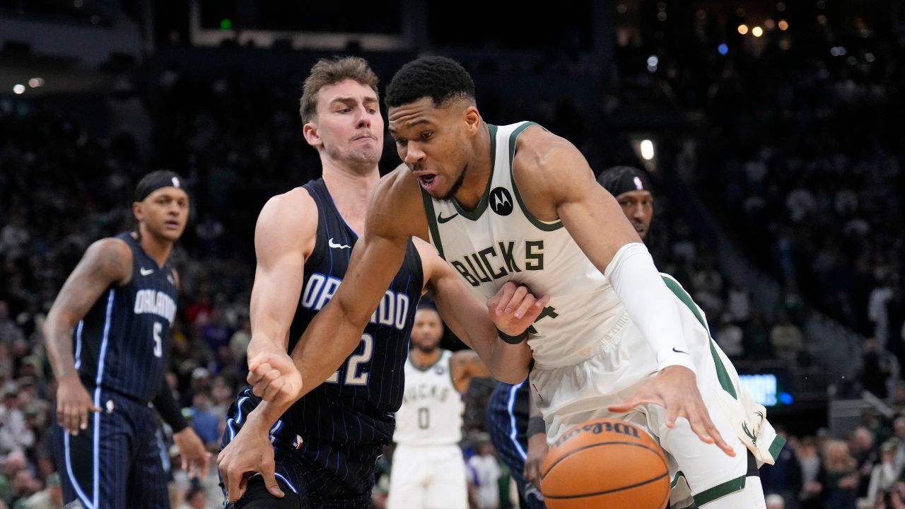 ; Milwaukee Bucks forward Giannis Antetokounmpo (34) drives against Orlando Magic forward Franz Wagner (22) in the first half at Fiserv Forum