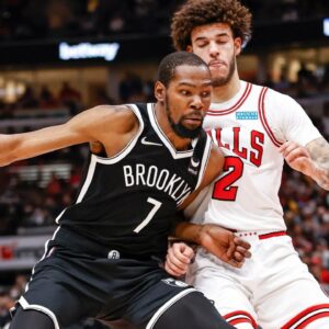 Brooklyn Nets forward Kevin Durant (7) drives to the basket against Chicago Bulls guard Lonzo Ball (2) during the second half at United Center