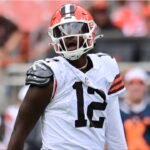Cleveland Browns quarterback Shedeur Sanders (12) reacts during the second half against the Los Angeles Rams at Huntington Bank Field.