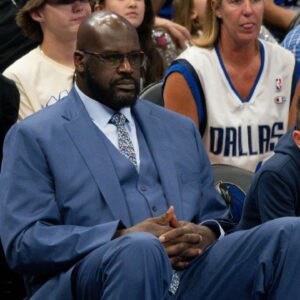 Shaquille O'Neal watches the game between the Dallas Mavericks and the Minnesota Timberwolves in game four of the western conference finals for the 2024 NBA playoffs at American Airlines Center
