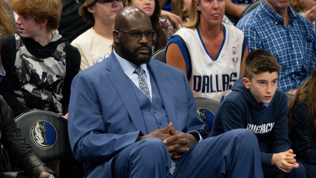 Shaquille O'Neal watches the game between the Dallas Mavericks and the Minnesota Timberwolves in game four of the western conference finals for the 2024 NBA playoffs at American Airlines Center