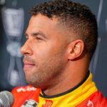 Bubba Wallace answers questions from the media during NASCAR Cup Series Playoff Media Day at Charlotte Convention Center.