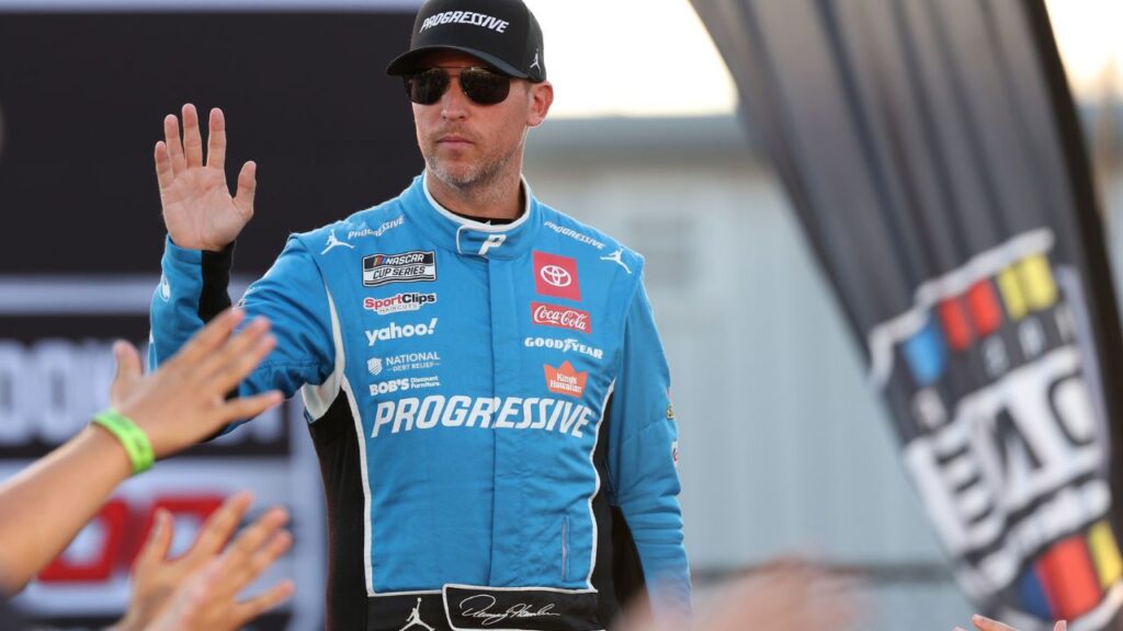 NASCAR Cup Series driver Denny Hamlin (11) waves to fans during driver introductions prior to the NASCAR Cup Series Cook Out 400 at Richmond Raceway.