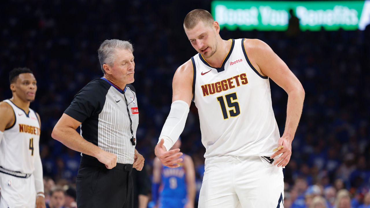 Denver Nuggets center Nikola Jokic (15) talks to an official during a break in play against the Oklahoma City Thunder in the second quarter during game seven of the second round for the 2025 NBA Playoffs at Paycom Center