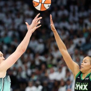 New York Liberty forward Breanna Stewart (30) shoots as Minnesota Lynx forward Napheesa Collier (24) defends during the second half of game three of the 2024 WNBA Finals at Target Center.