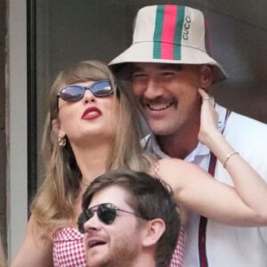 Recording artist Taylor Swift and Kansas City Chiefs tight end Travis Kelce talk during the men’s singles final of the 2024 U.S. Open tennis tournament at USTA Billie Jean King National Tennis Center.