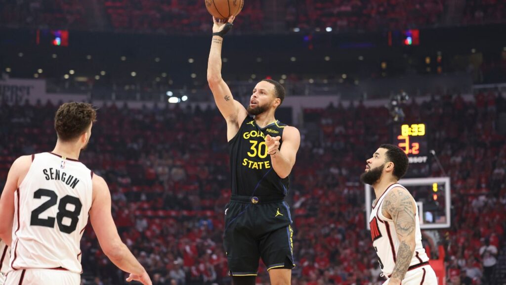 Golden State Warriors guard Stephen Curry (30) shoots the ball during the first quarter of game seven of the first round for the 2025 NBA Playoffs against the Houston Rockets at Toyota Center.