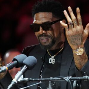 Udonis Haslem speaks after his jersey was lifted to the rafters during the retirement ceremony during halftime of the game between the Miami Heat and the Atlanta Hawks Kaseya Center.