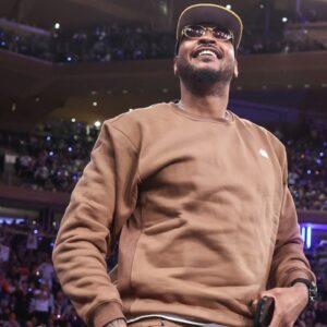 Former NBA forward Carmelo Anthony waves to the crowd during game five of first round for the 2025 NBA Playoffs between the against the Detroit Pistons and the New York Knicks at Madison Square Garden.