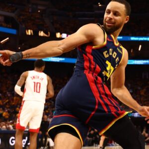 Golden State Warriors guard Stephen Curry (30) looks over his shoulder after scoring a basket against the Houston Rockets during the third quarter of game four of the 2025 NBA Playoffs first round at Chase Center.