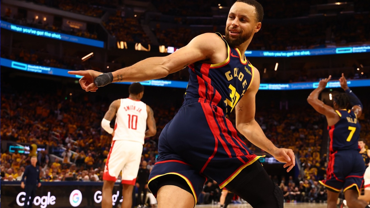Golden State Warriors guard Stephen Curry (30) looks over his shoulder after scoring a basket against the Houston Rockets during the third quarter of game four of the 2025 NBA Playoffs first round at Chase Center.