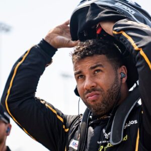 Bubba Wallace (23) puts on his helmet during NASCAR Cup Series qualifying on Aug. 2, 2025, at Iowa Speedway in Newton, Iowa.