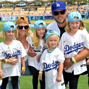 Los Angeles Rams quarterback Matthew Stafford (9) with his wife Kelly with their 4 daughters on the field prior to the game between the Los Angeles Dodgers and the Atlanta Braves at Dodger Stadium. Stafford was at the game on Rams day.