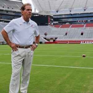 Alabama football coach Nick Saban stands on the turf inside Bryant-Denny Stadium during his team's media day in 2019.