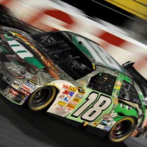 NASCAR Sprint Cup Series driver Kyle Busch (18) wins the Dodge Challenger 500 at Darlington Raceway.
