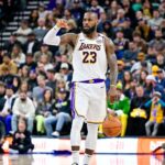 Dec 1, 2024; Salt Lake City, Utah, USA; Los Angeles Lakers forward LeBron James (23) dribbles the ball downcourt against the Utah Jazz during the second half at the Delta Center.