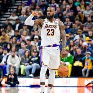 Dec 1, 2024; Salt Lake City, Utah, USA; Los Angeles Lakers forward LeBron James (23) dribbles the ball downcourt against the Utah Jazz during the second half at the Delta Center.