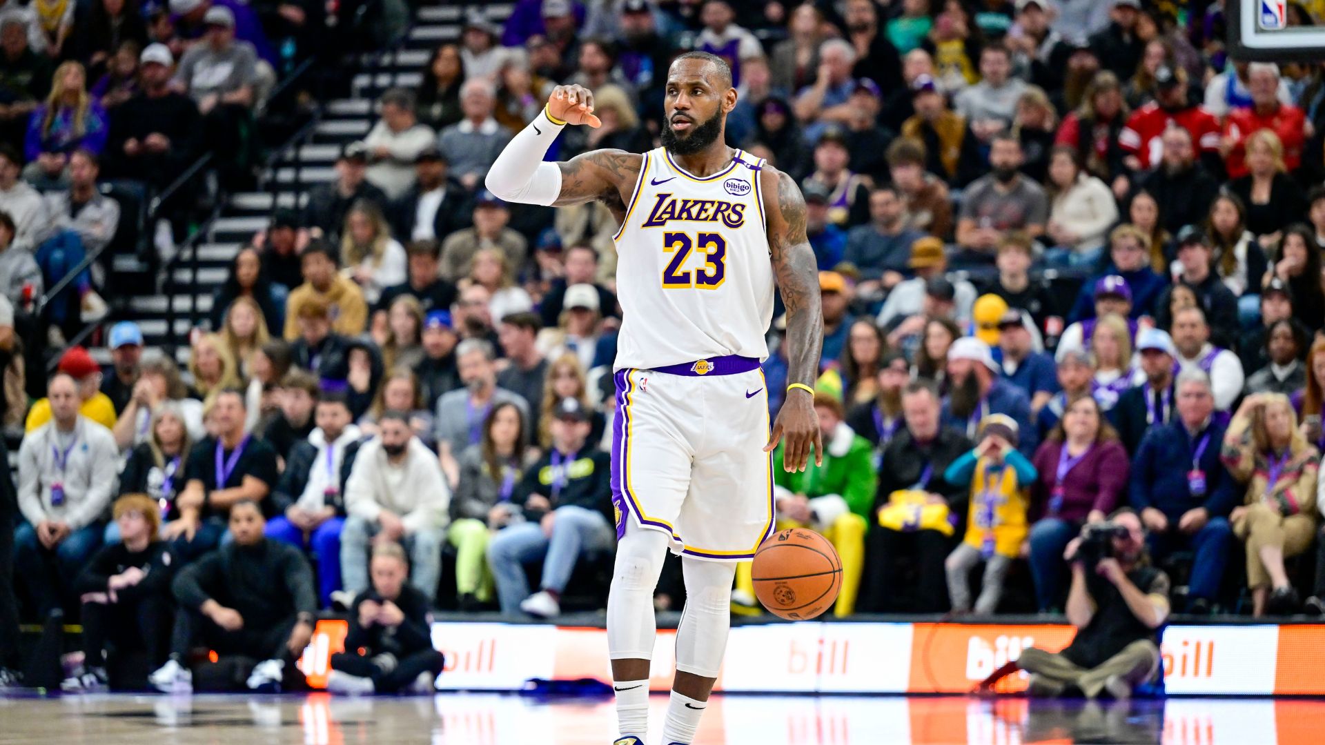Dec 1, 2024; Salt Lake City, Utah, USA; Los Angeles Lakers forward LeBron James (23) dribbles the ball downcourt against the Utah Jazz during the second half at the Delta Center.