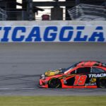 NASCAR Cup Series driver Martin Truex Jr. (19) competes during qualifying for the Camping World 400 at Chicagoland Speedway.