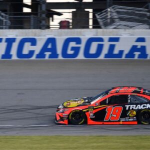 NASCAR Cup Series driver Martin Truex Jr. (19) competes during qualifying for the Camping World 400 at Chicagoland Speedway.