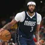 Apr 18, 2025; Memphis, Tennessee, USA; Dallas Mavericks forward Anthony Davis (3) dribbles during the second quarter against the Memphis Grizzlies at FedExForum