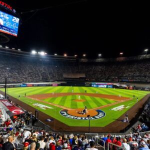 Cincinnati Reds pitcher Chase Burns throws a pitch to Atlanta Braves batter Matt Olson in the MLB Speedway Classic held at Bristol Motor Speedway in Bristol, Tenn., on August 2, 2025.