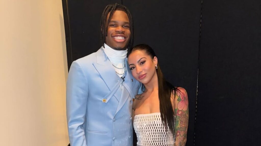 Travis Hunter with Leanna Lenee