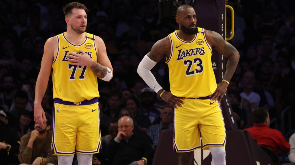 Los Angeles Lakers guard Luka Doncic (77) and forward LeBron James (23) during the second quarter against the Minnesota Timberwolves at Crypto.com Arena.
