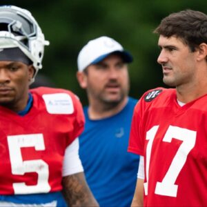 Indianapolis Colts quarterbacks Anthony Richardson Sr. (5), Daniel Jones (17) and Riley Leonard (15) prepare for drills Monday, July 28, 2025, during training camp held at Grand Park in Westfield.