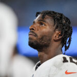 Cleveland Browns quarterback Shedeur Sanders (12) on the sideline during the second half against the Carolina Panthers at Bank of America Stadium.