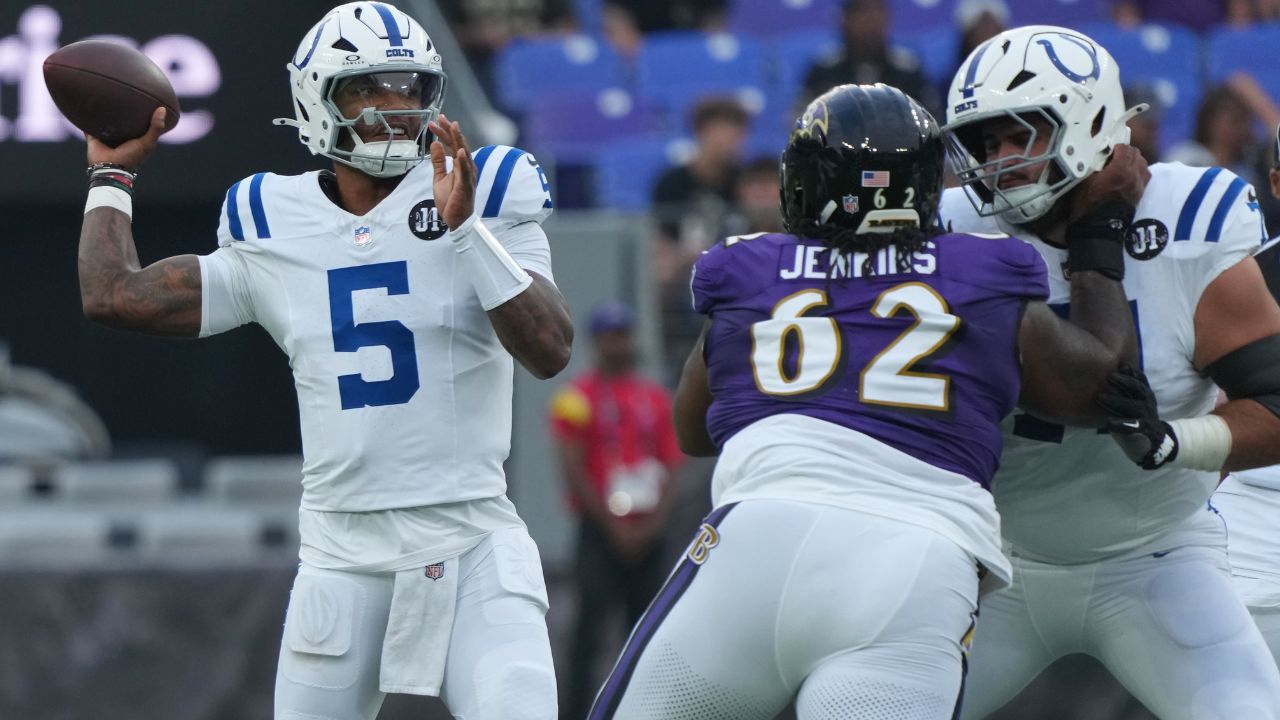 Indianapolis Colts quarterback Anthony Richardson Sr. (5) looks to pass during the first quarter pressured by Baltimore Ravens nose tackle John Jenkins (62) at M&T Bank Stadium.