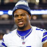 Dallas Cowboys defensive end Micah Parsons (11) reacts after the game against the Baltimore Ravens at AT&T Stadium.