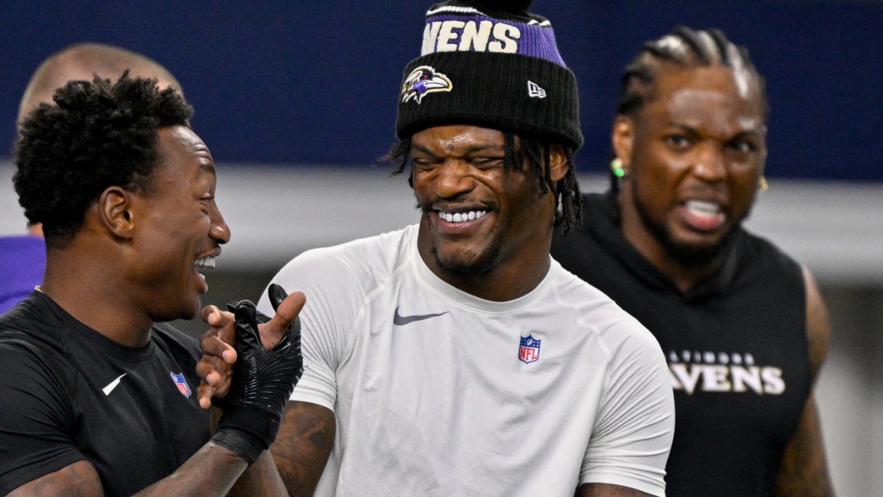 Aug 16, 2025; Arlington, Texas, USA; Baltimore Ravens wide receiver Zay Flowers (4) jokes with quarterback Lamar Jackson (8) before the game between the Dallas Cowboys and the Baltimore Ravens at AT&T Stadium.