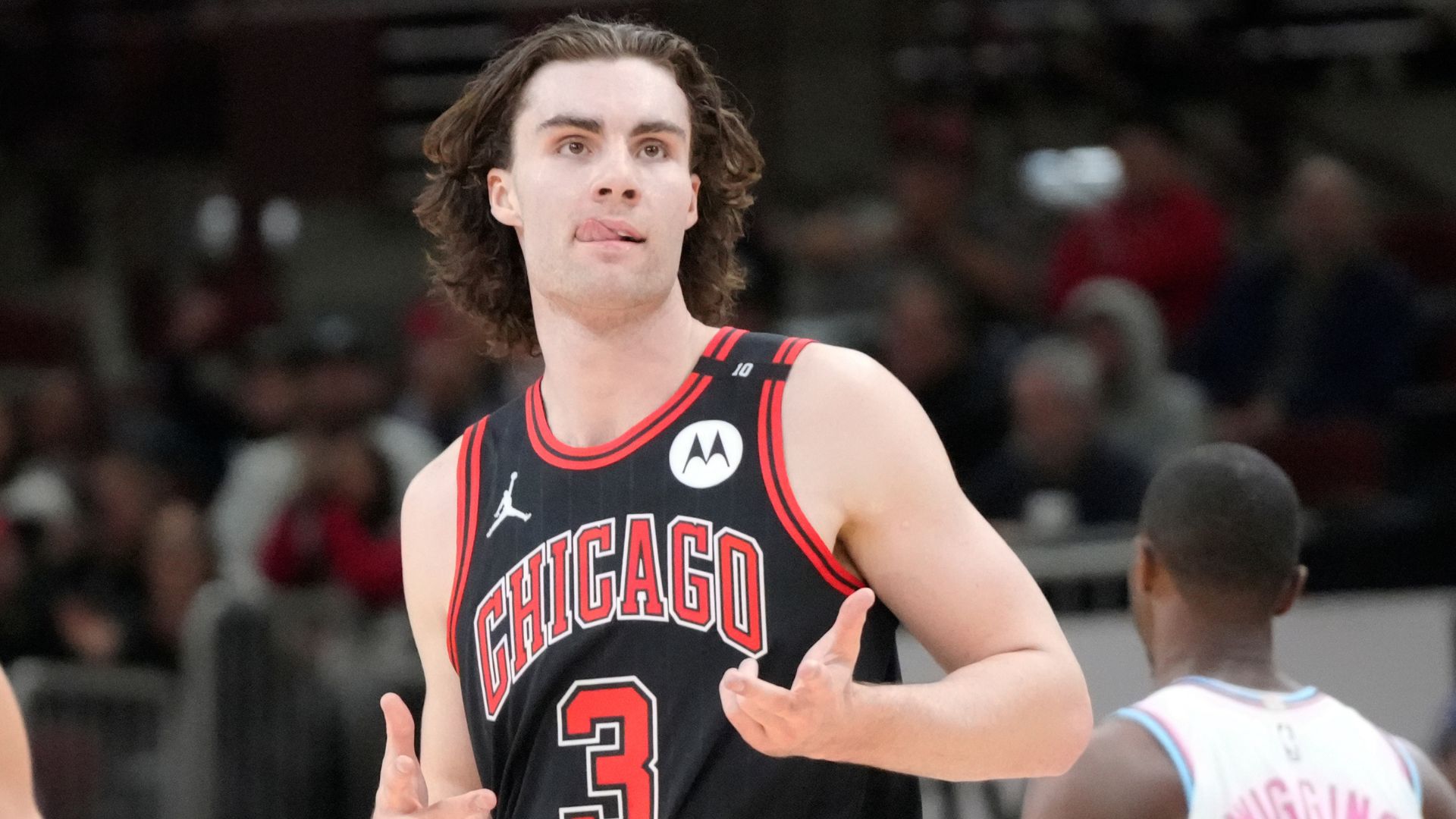 Apr 9, 2025; Chicago, Illinois, USA; Chicago Bulls guard Josh Giddey (3) reacts after making a three point basket against the Miami Heat during the second half at United Cente