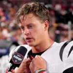 Cincinnati Bengals quarterback Joe Burrow (9) is interviewed by sideline reporter Laura Rutledge in the third quarter of the NFL Preseason Week 2 game between the Washington Commanders and the Cincinnati Bengals at Northwest Stadium in Landover, Md., on Monday, Aug. 18, 2025. The Bengals won the game, 31-17.