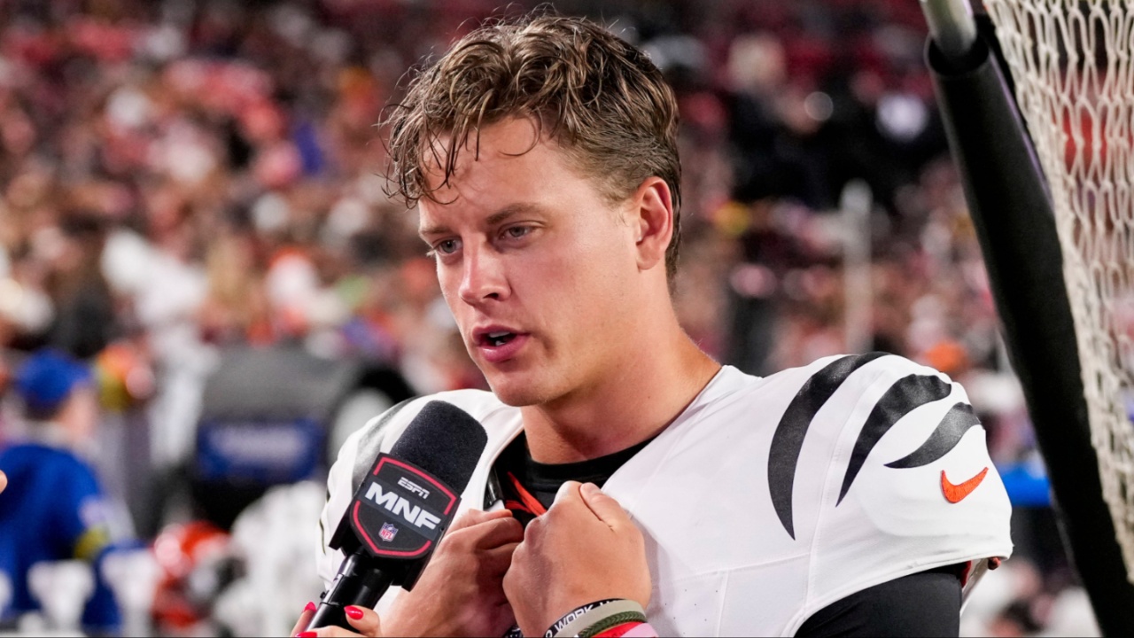 Cincinnati Bengals quarterback Joe Burrow (9) is interviewed by sideline reporter Laura Rutledge in the third quarter of the NFL Preseason Week 2 game between the Washington Commanders and the Cincinnati Bengals at Northwest Stadium in Landover, Md., on Monday, Aug. 18, 2025. The Bengals won the game, 31-17.