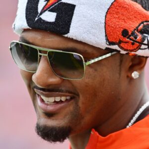 Cleveland Browns quarterback Deshaun Watson (4) on the sidelines during the first quarter against the Los Angeles Rams at Huntington Bank Field.