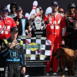 NASCAR Cup Series driver Shane Van Gisbergen celebrates with his team in victory lane after winning the Go Bowling at The Glen at Watkins Glen International.