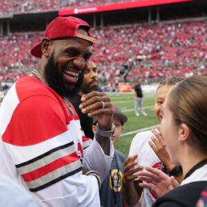 LeBron James talks to fans prior to the NCAA football game between the Ohio State Buckeyes and Notre Dame Fighting Irish at Ohio Stadium.