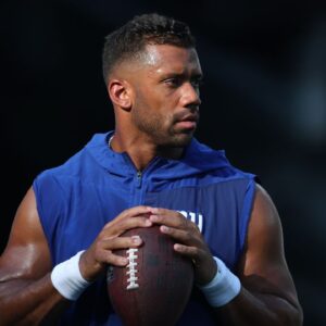 New York Giants quarterback Russell Wilson (3) warms up before the preseason game against the New York Jets at MetLife Stadium.