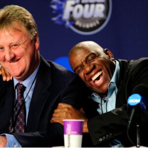 Michigan State Spartans and NBA former player Magic Johnson (right) hugs NBA former player Larry Bird (left) during a press conference before the championship game of the Final Four in the 2009 NCAA mens basketball tournament against the North Carolina Tar Heels at Ford Field.