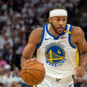Golden State Warriors guard Moses Moody (4) drives to the basket past Minnesota Timberwolves guard Mike Conley (10) in the second half during game five of the second round for the 2025 NBA Playoffs at Target Center.
