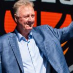 Larry Bird waves at the crowd gathered Thursday, May 30, 2024, for the grand opening ceremony of the Larry Bird Museum in Terre Haute, Indiana.
