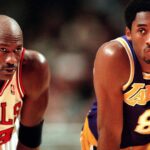 Michael Jordan has a chat with the Lakers Kobe Bryant during free throws in 1997