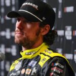 Ryan Blaney answers questions from the media during NASCAR Cup Series Playoff Media Day at Charlotte Convention Center. Mandatory Credit: Jim Dedmon-Imagn Images