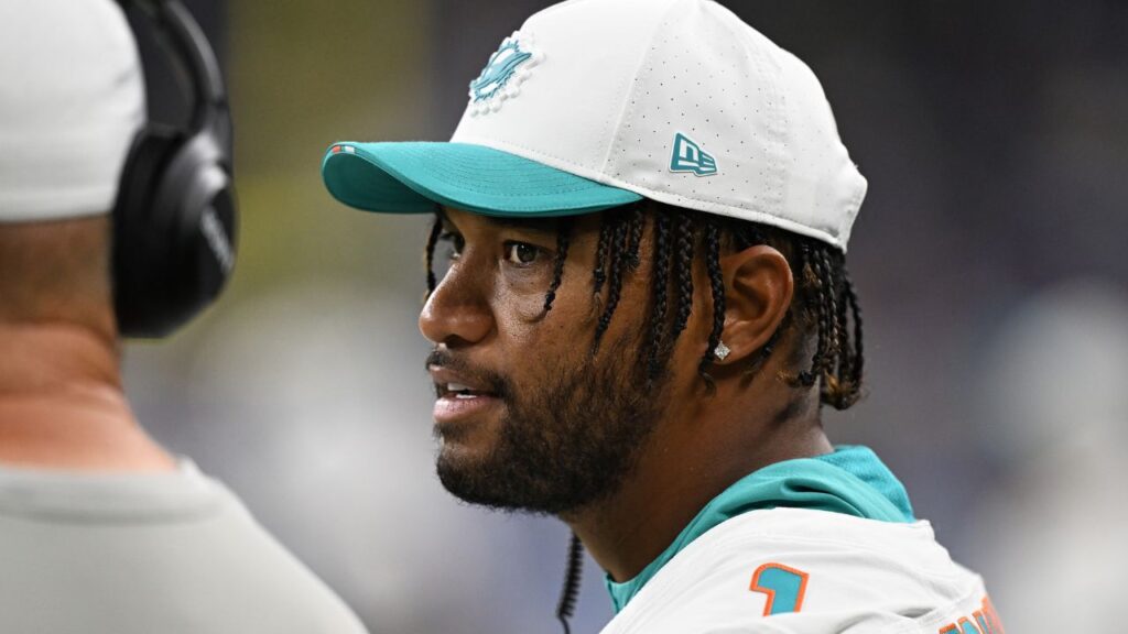 Miami Dolphins starting quarterback Tua Tagovailoa (1) on the sidelines during the Dolphins preseason game against the Detroit Lions in the fourth quarter at Ford Field.