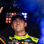 Austin Cindric (2) waves to fans during introductions before the NASCAR Cup Series Iowa Corn 350 on Aug. 3, 2025, at Iowa Speedway in Newton, Iowa. William Byron (24) finished the race first.