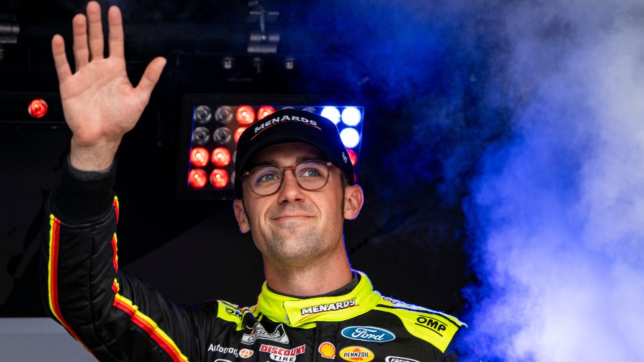 Austin Cindric (2) waves to fans during introductions before the NASCAR Cup Series Iowa Corn 350 on Aug. 3, 2025, at Iowa Speedway in Newton, Iowa. William Byron (24) finished the race first.