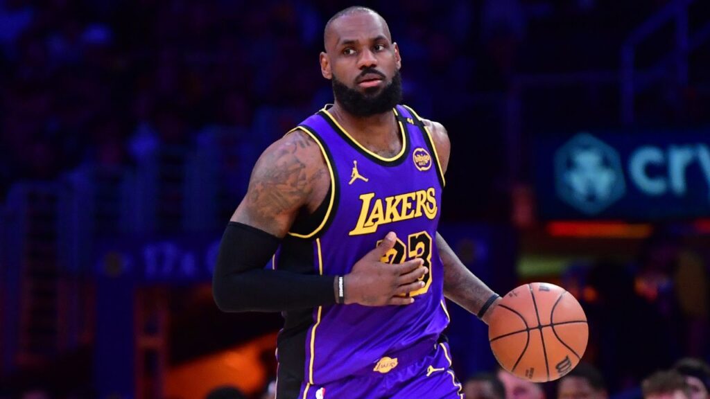 Los Angeles Lakers forward LeBron James (23) dribbles the ball against the Dallas Mavericks during the second half at Crypto.com Arena.