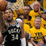 Milwaukee Bucks forward Giannis Antetokounmpo (34) shoots the ball while Indiana Pacers guard Andrew Nembhard (2) defends during game five of the first round for the 2024 NBA Playoffs at Gainbridge Fieldhouse.